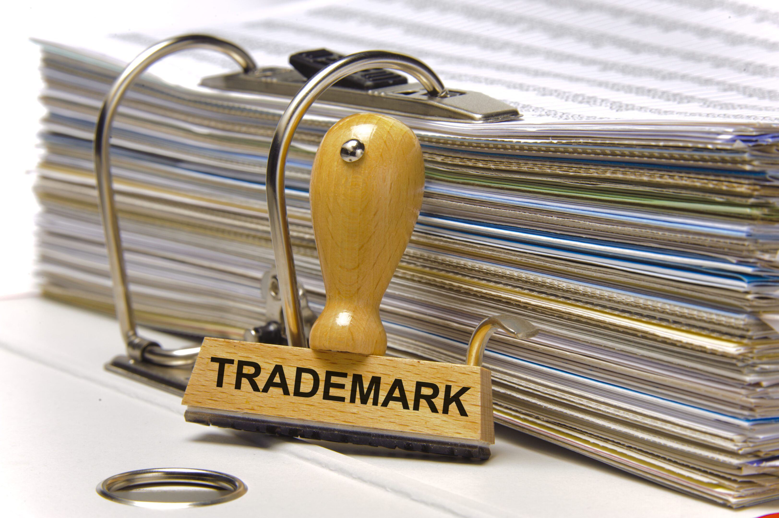 Trademark stamp with stacked documents.
